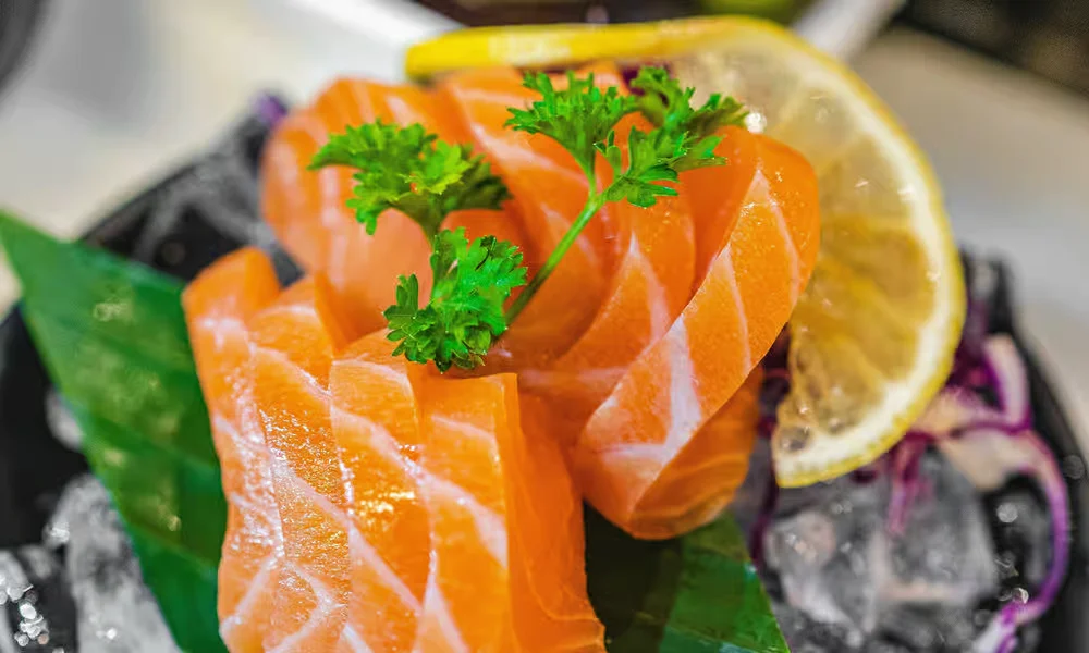 Organic salmon sashimi with lemon and fresh herbs at Meal Set Bistro | Sushi, Academy Road Winnipeg