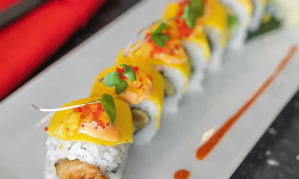 Mangolicious roll topped with fresh mango at Meal Set Bistro | Sushi, Academy Road Winnipeg