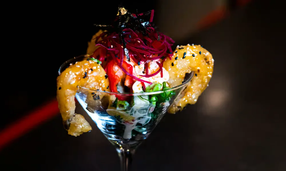 Spicy mango prawns served in a cocktail glass at Meal Set Bistro | Sushi, Winnipeg